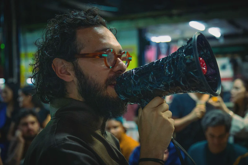 Limpieza ritual, recorrido por la plaza de mercado y almuerzo en la Galería del Barrio Bolívar